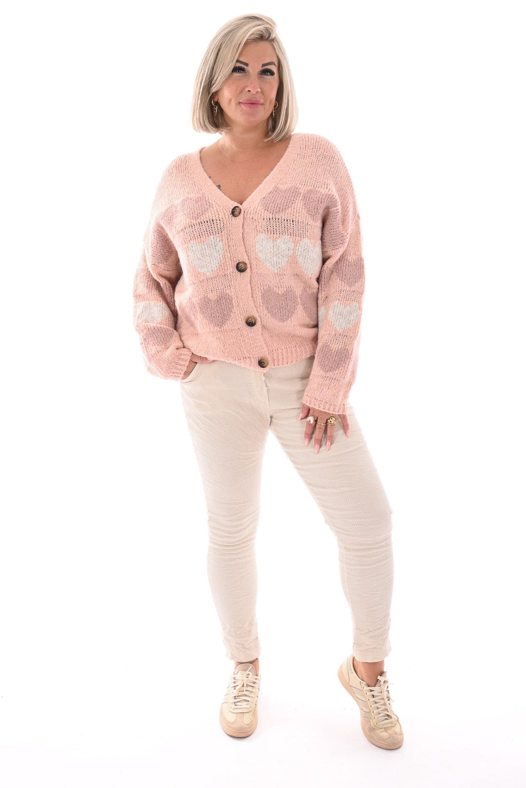 Chaqueta de punto fino con corazones rosa claro