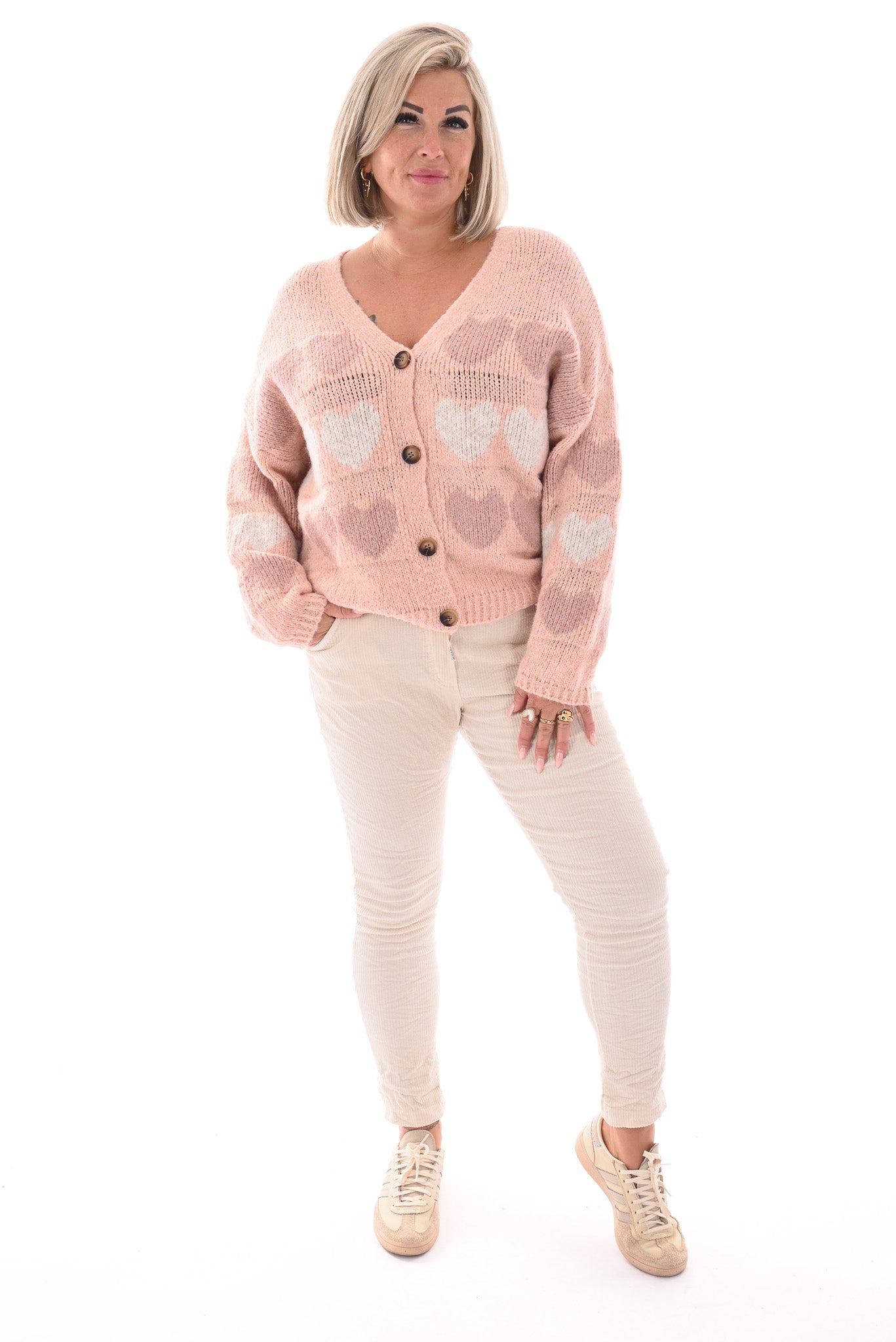 Chaqueta de punto fino con corazones rosa claro