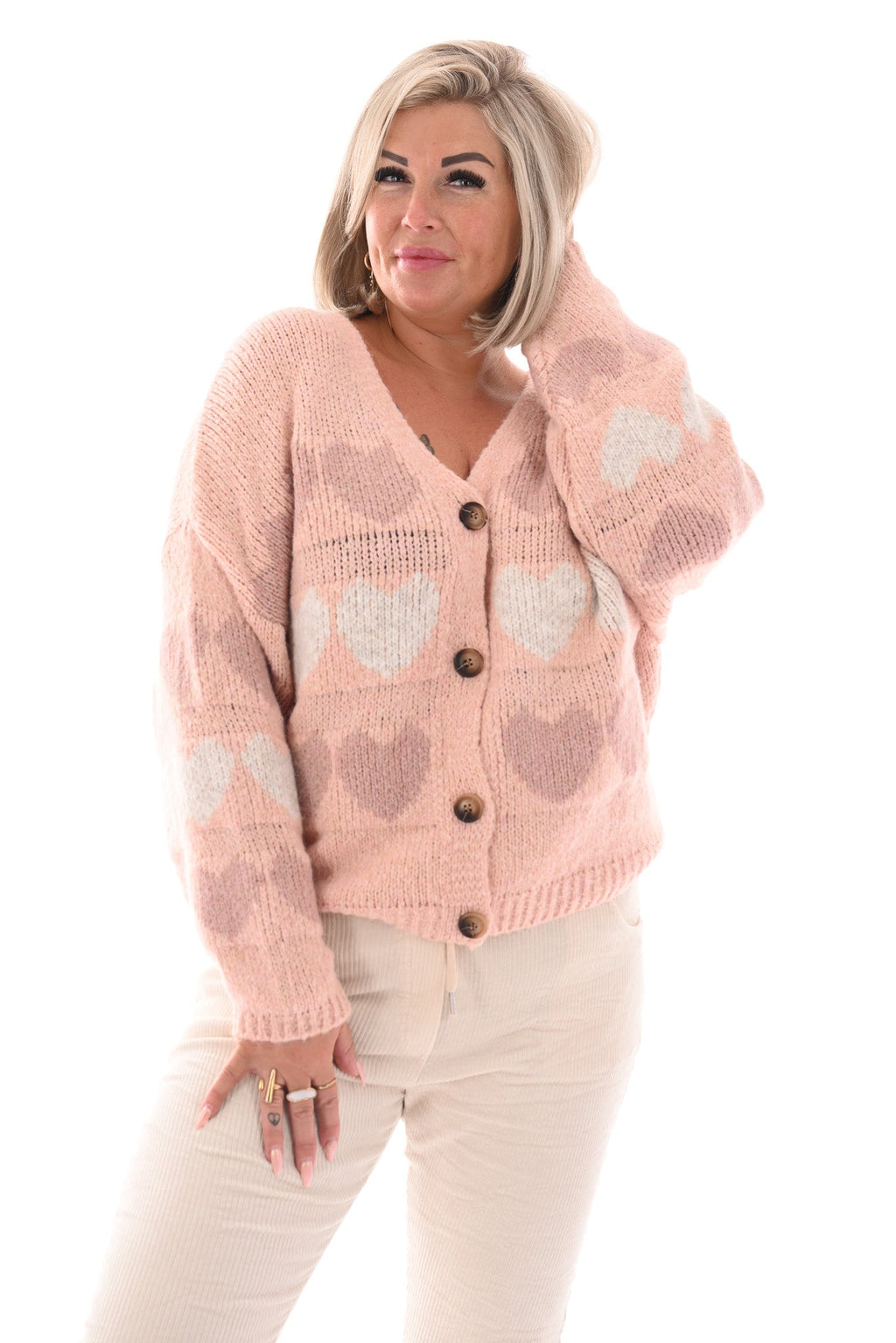 Chaqueta de punto fino con corazones rosa claro